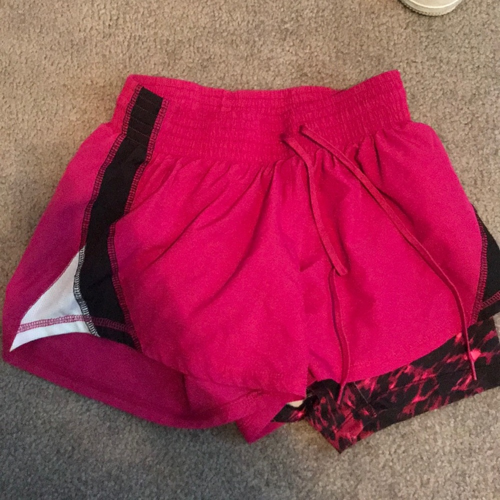 Pink Champion Running Shorts.